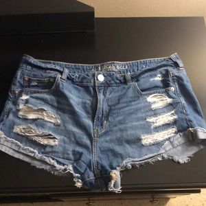 American eagle low cut denim blue shorts with rips